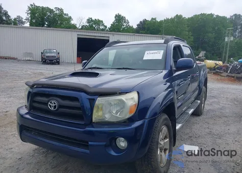 2005 Toyota Tacoma Base V6 из США, поврежденный, VIN 3TMLU42N95M001038